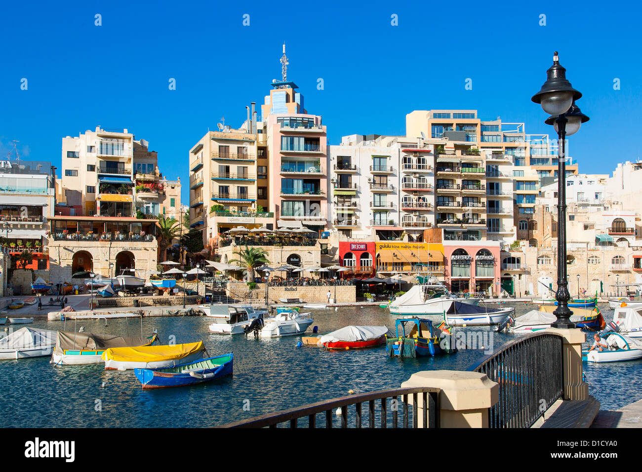 Spinola Bay with restaurants, St. Julian`s, Malta, Mediterranean, Europe Stock Photo